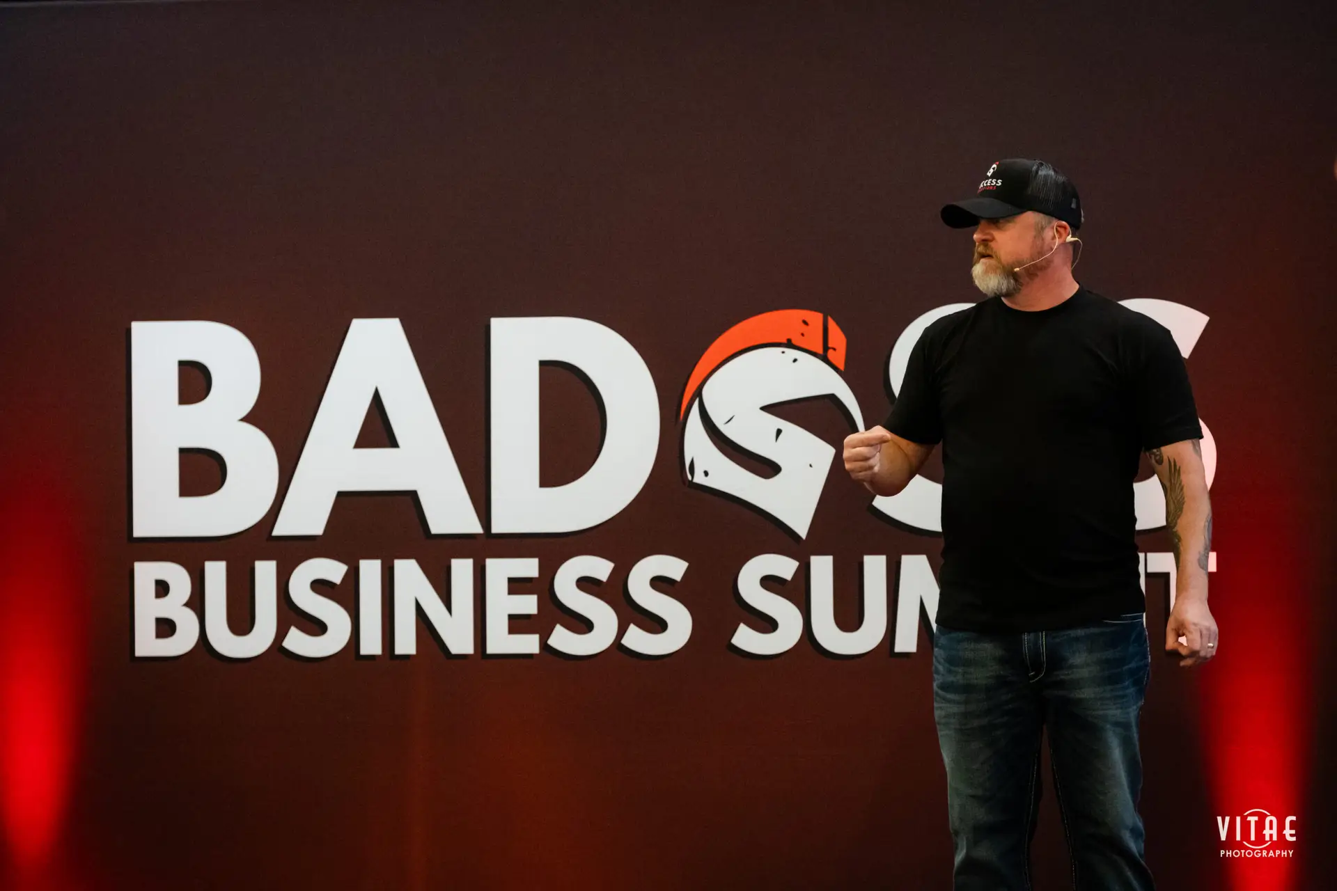 Donnie Boivin Talking about Networking on Stage at the Badass Business Summit