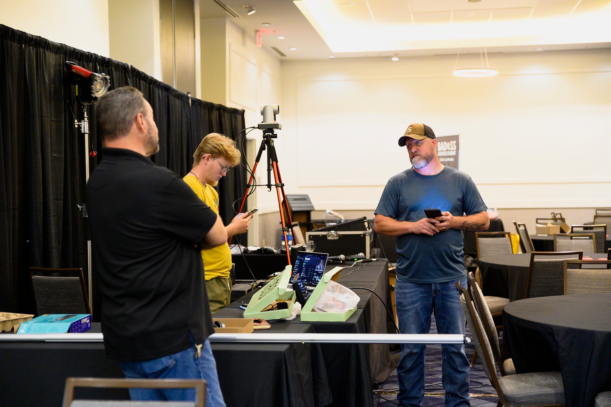 Two business professionals in a genuine conversation at a networking event. Stop Claiming You Have Great Customer Service |